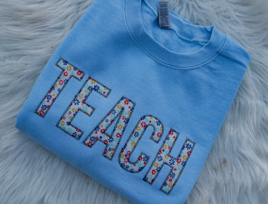 Teach Floral Embroidered Sweatshirt